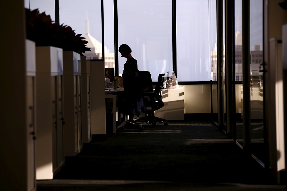 An employee of software company Nuix stands in their office located in central Sydney April 5, 2016. u00e2u20acu201d Reuters pic