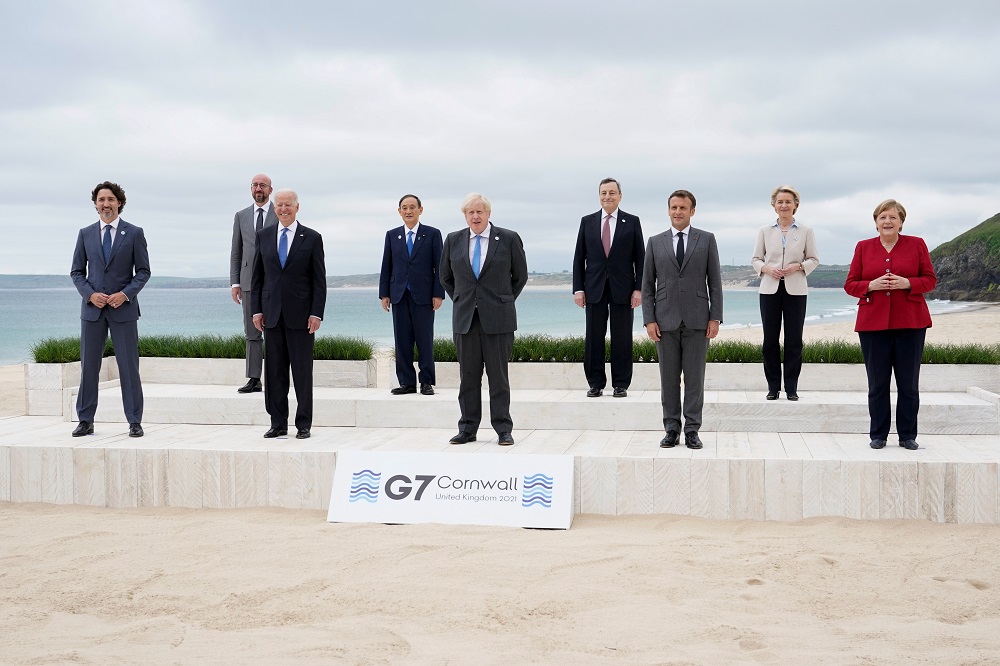 G7 leaders pose for a group photo ahead of the G7 summit in Carbis Bay, Cornwall, Britain June 11, 2021. u00e2u20acu201d Pool pic via Reuters 