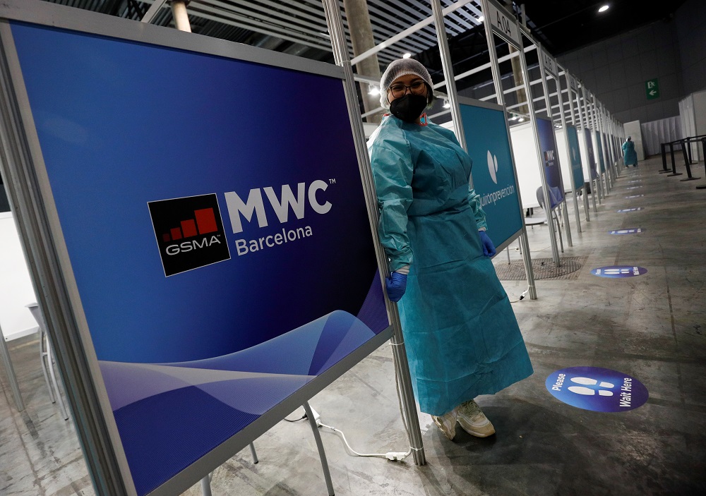 A health worker waits to test people for Covid-19 before the Mobile World Congress (MWC) at Fira de Barcelona, in Barcelona June 27, 2021. — Reuters pic