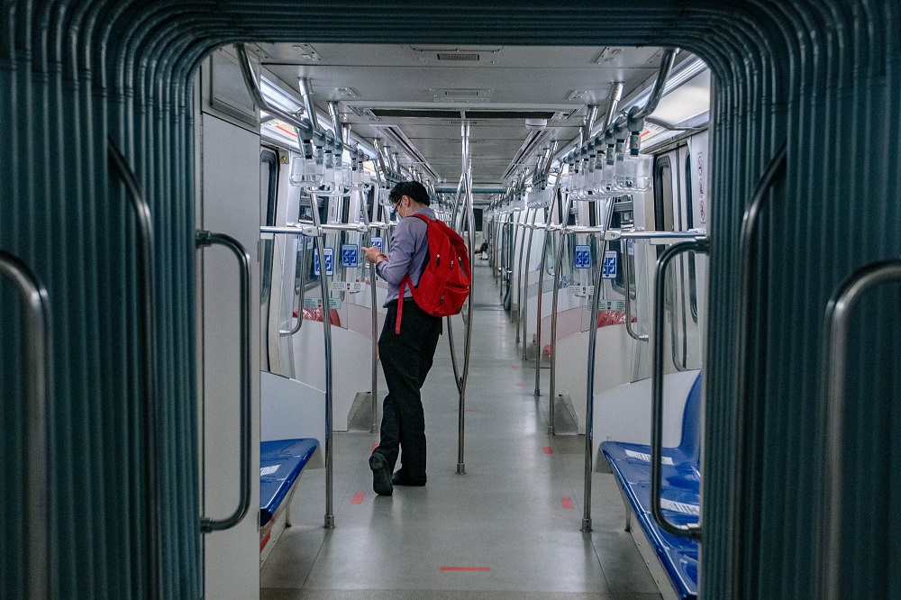 A passenger dons a face mask during a ride on the LRT train in Kuala Lumpur June 1, 2021. u00e2u20acu201d Picture by Firdaus Latif