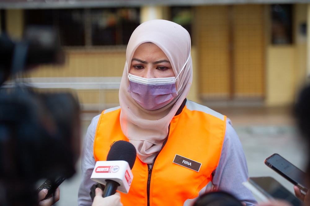 Women, Family and Community Development Minister Datuk Seri Rina Mohd Harun speaks to reporters at PPR Sri Sarawak in Kuala Lumpur June 1, 2021. u00e2u20acu201d Picture by Shafwan Zaidon