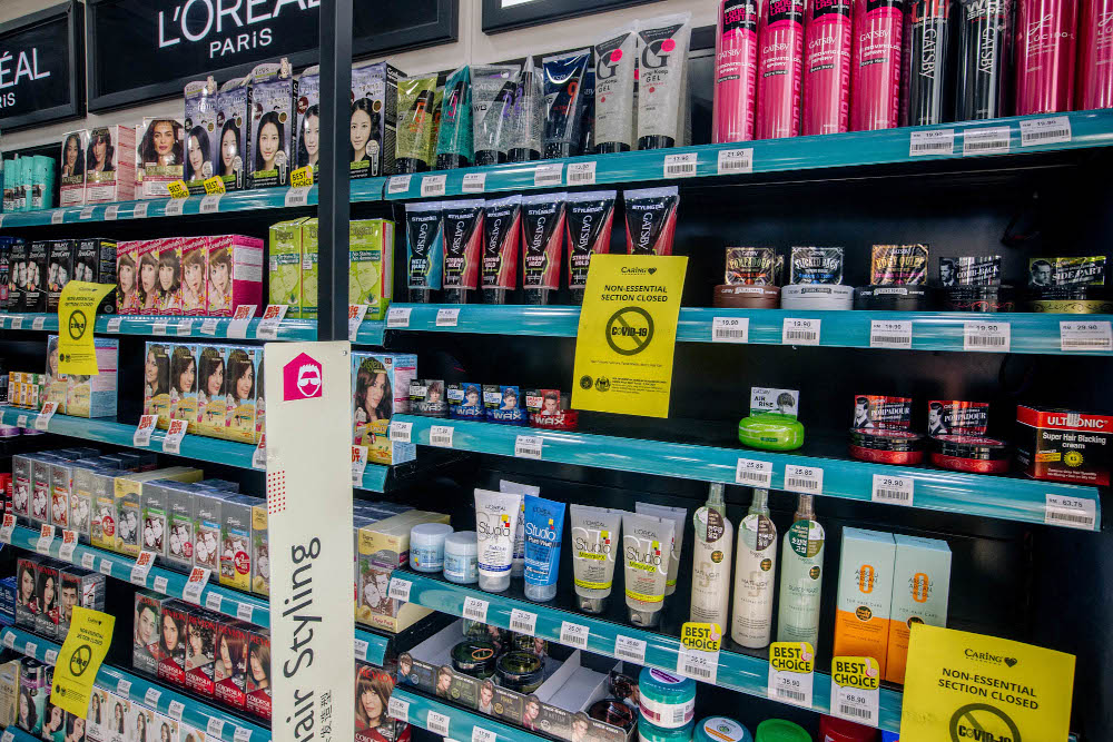 A section of a Caring pharmacy is seen in Kuala Lumpur June 4, 2021. The non-essential sections which selling hair colours, suncare, facial masks and menu00e2u20acu2122s hair gel are closed due to the Full Movement Control Order (FMCO). u00e2u20acu201d Picture by Firdaus Latif