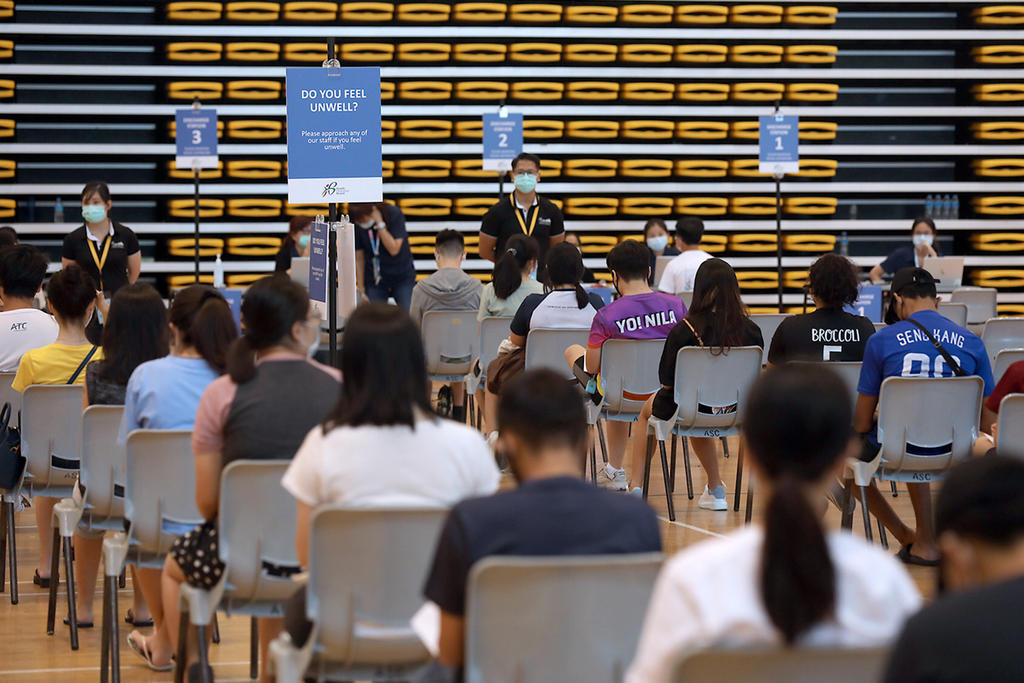 Students at a vaccination centre set up at the Institute of Technical Education College West in Chua Chu Kang on June 7, 2021. u00e2u20acu201d TODAY pic