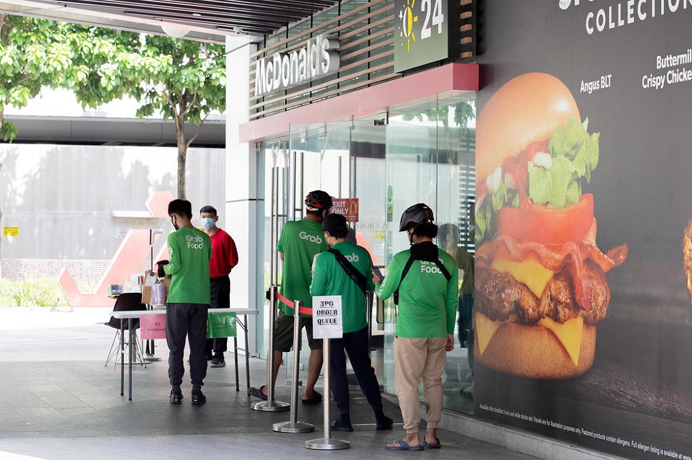 Food delivery riders collecting the McDonaldu00e2u20acu2122s BTS Meal at the fast-food outlet in Jem mall on June 21, 2021. u00e2u20acu201d TODAY pic