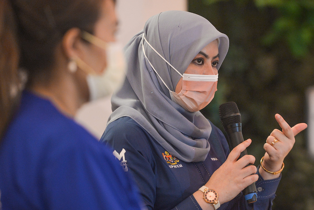 Minister of Women, Family and Community Development Datuk Seri Rina Harun visiting the first drive-through vaccination centre (PPV) for persons with disabilities (PwD) at Sime Darby Plantation on June 16,2021. u00e2u20acu201d Picture by Miera Zulyanan