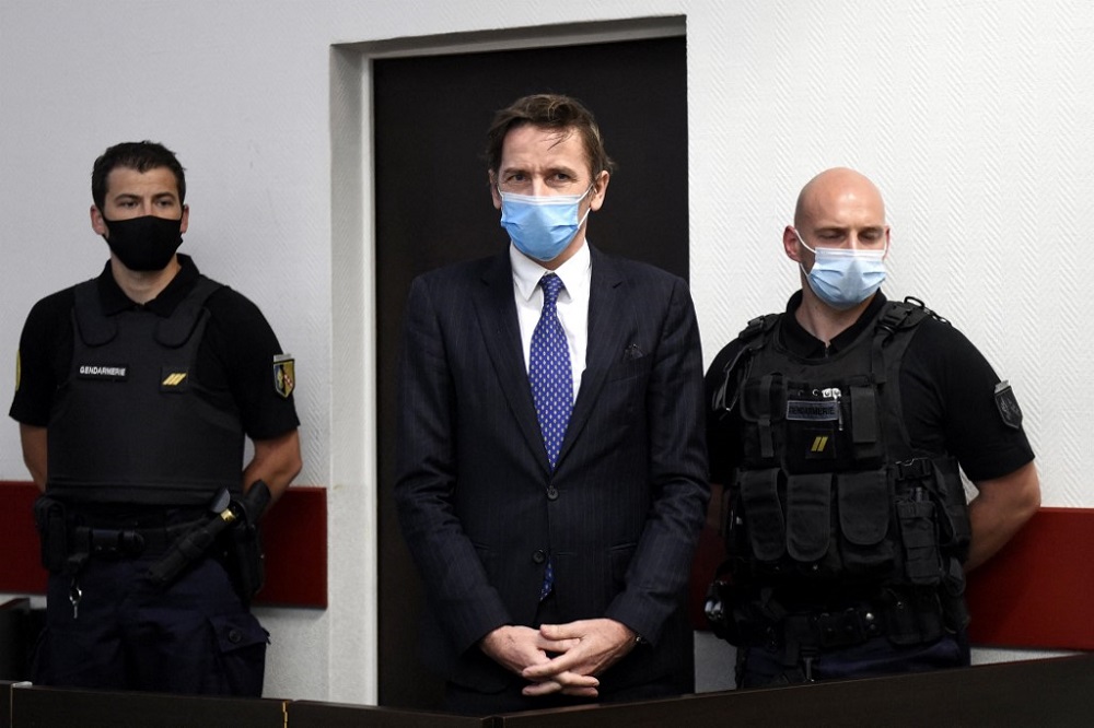 Remy Daillet (centre) stands at the beginning of his audition in front of the liberties and detention judge at Nancy courthouse in Nancy, France June 16, 2021. u00e2u20acu201d AFP pic