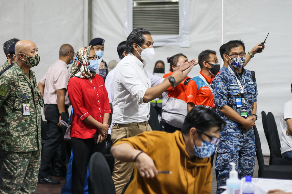 Minister of Science Technology and Innovation Khairy Jamaluddin visits the Covid-19 vaccination centre in Bukit Jalil June 21, 2021. u00e2u20acu201d Picture by Ahmad Zamzahuri 