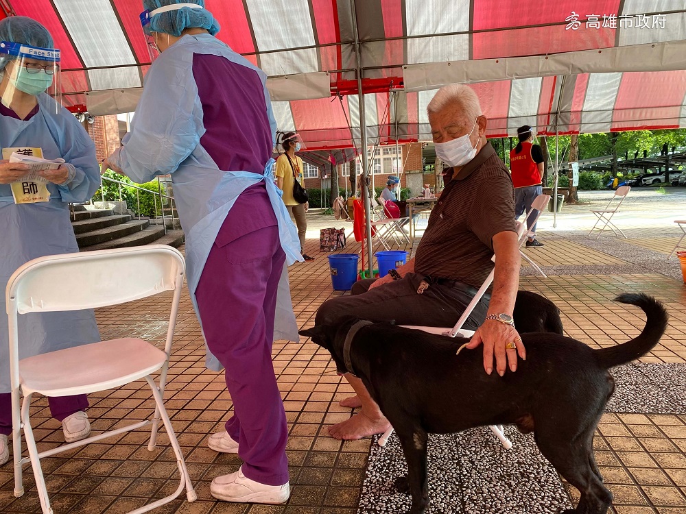 Two dogs in Kaohsiung, Taiwan, accompanied their elderly owner to a Covid-19 vaccination centre. u00e2u20acu201d Picture via Facebook/ bravo.Kaohsiung