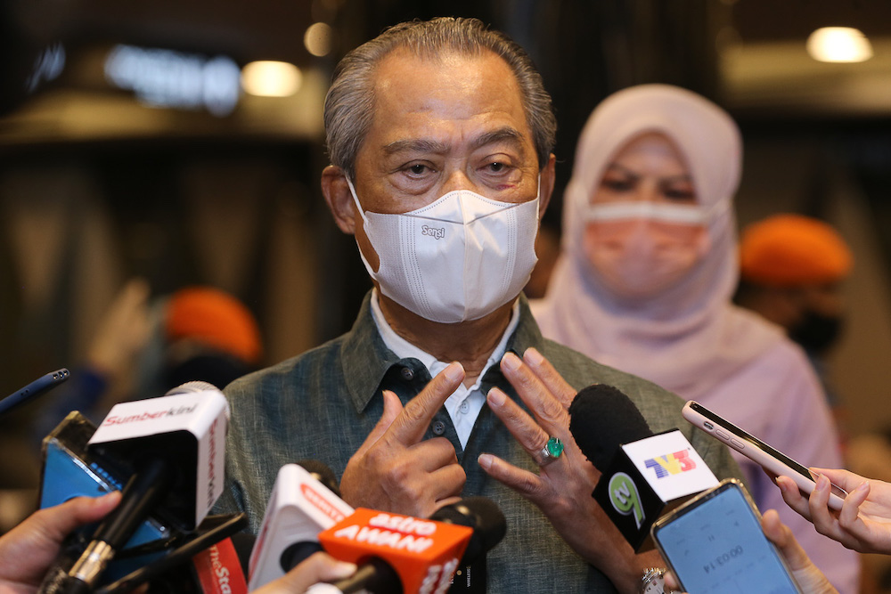 Prime Minister Tan Sri Muhyiddin Yassin speaks to members of the media during his visit to the vaccination centre at Sunway Pyramid Convention Centre in Petaling Jaya June 27, 2021. u00e2u20acu201d Picture by Yusof Mat Isa