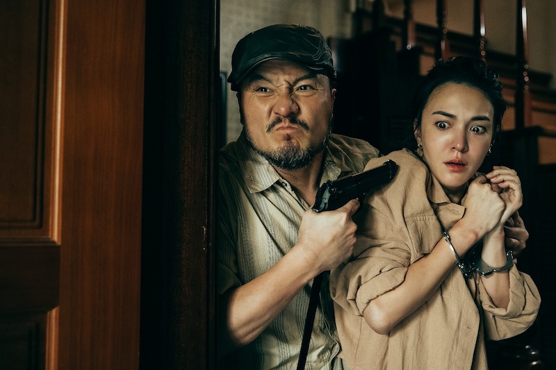 Lee and Taiwanese actress Sandrine Pinna in a scene from the crime drama series. — Picture courtesy of HBO Asia