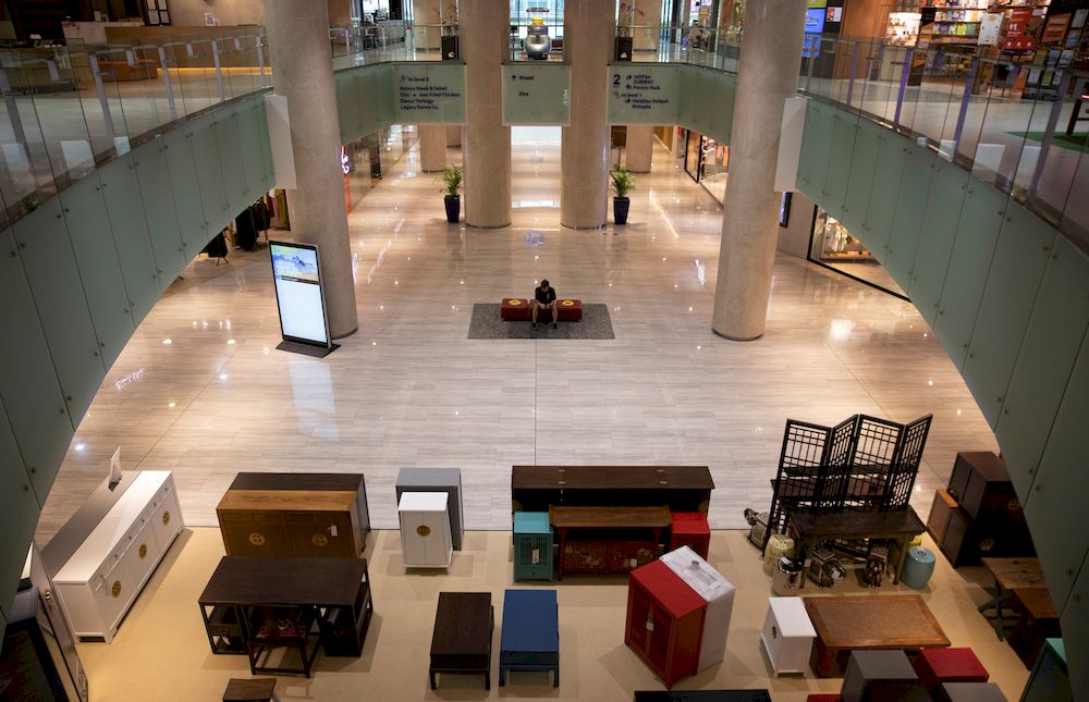 A man sits in an empty mall during the coronavirus disease (Covid-19) pandemic in Singapore May 31, 2021. u00e2u20acu201d Reuters pic