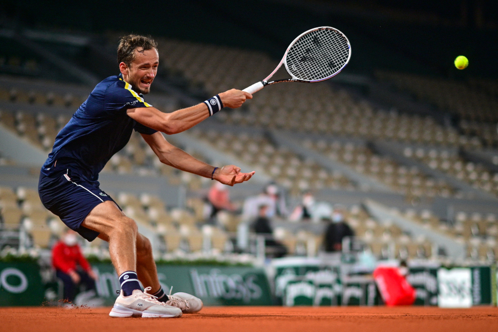 Russiau00e2u20acu2122s Daniil Medvedev returns the ball to Tommy Paul of the US during their menu00e2u20acu2122s singles second round tennis match on Day 4 of The Roland Garros 2021 French Open tennis tournament in Paris June 2, 2021. u00e2u20acu201d AFP picnn