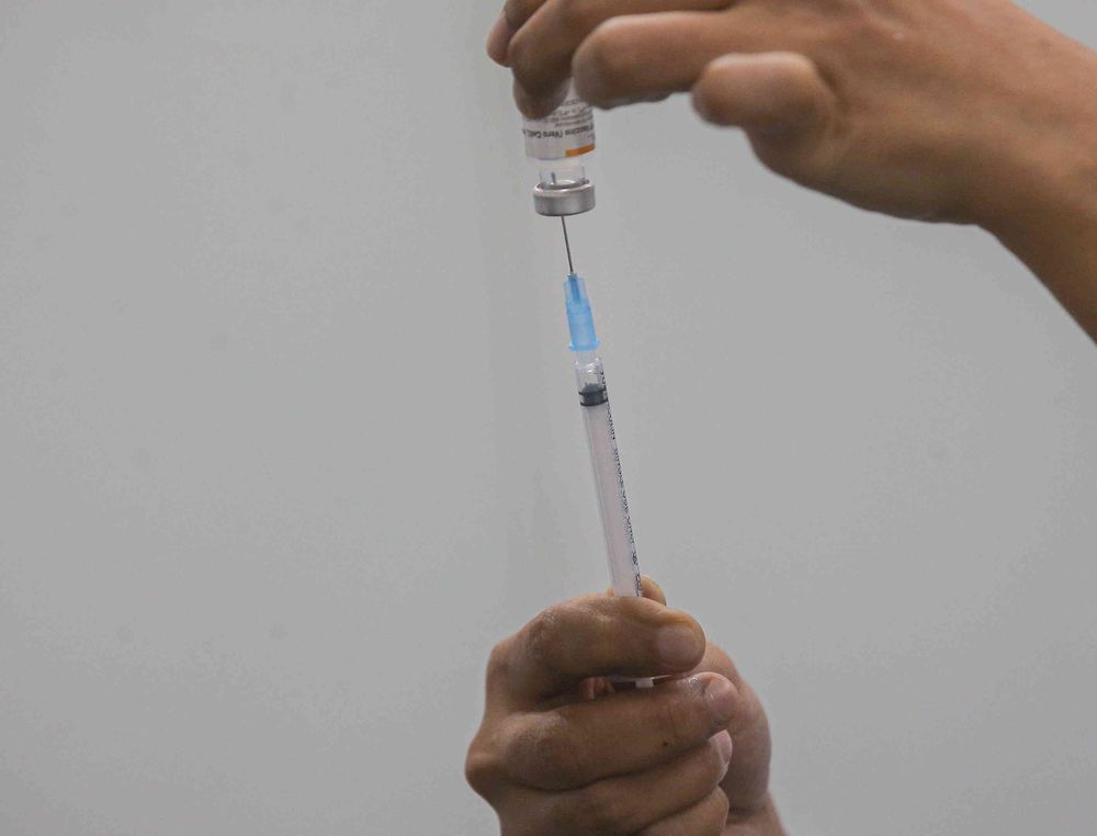 The second phase of vaccination under the National Immunisation Programme going smoothly according to schedule at the vaccination centre (PPV) Stadium Indera Mulia in Ipoh, Perak on June 4, 2021. u00e2u20acu201d Picture by Farhan Najib