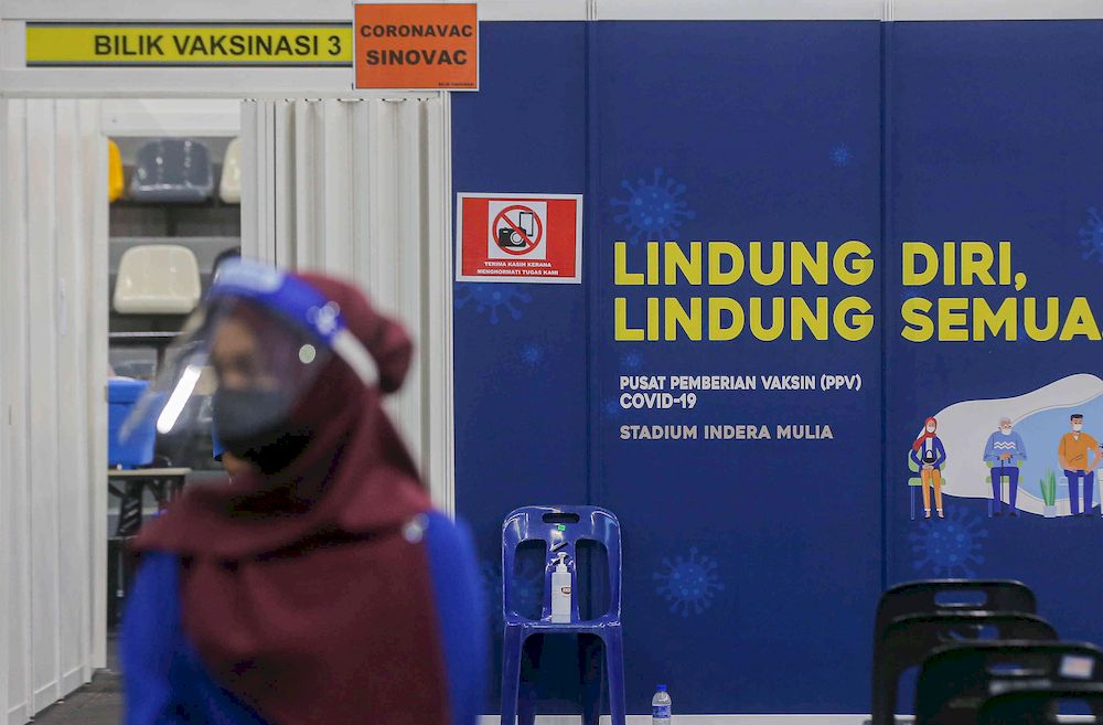 The second phase of vaccination under the National Immunisation Programme going smoothly according to schedule at the vaccination centre (PPV) Stadium Indera Mulia in Ipoh, Perak on June 4, 2021. u00e2u20acu201d Picture by Farhan Najib