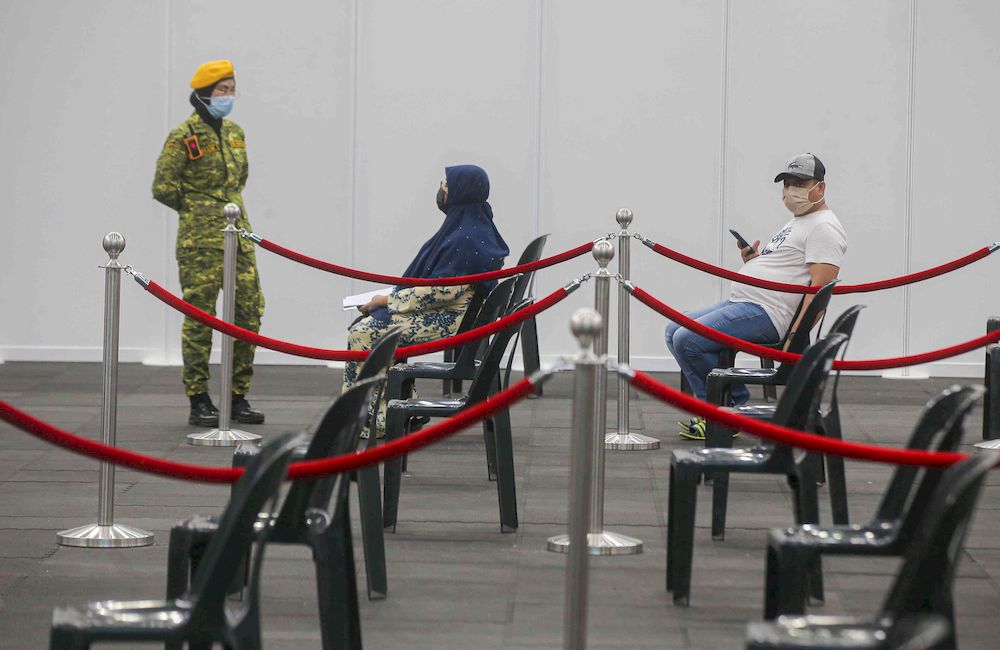 The second phase of vaccination under the National Immunisation Programme going smoothly according to schedule at the vaccination centre (PPV) Stadium Indera Mulia in Ipoh, Perak on June 4, 2021. u00e2u20acu201d Picture by Farhan Najib