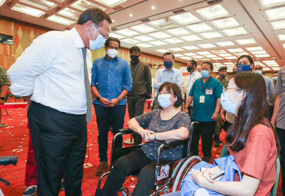 Johor Mentri Besar Datuk Hasni Mohammad and Khairy Jamaluddin visit the mega vaccination centre at the Persada International Convention Centre in Johor Baru, June 8, 2021. u00e2u20acu201d Picture courtesy of the Johor Mentri Besaru00e2u20acu2122s Officen