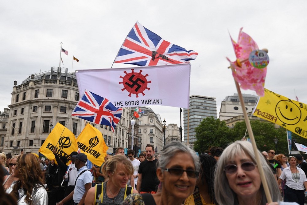 Anti-Vaccine and anti-lockdown protestors march through central London, on June 26, 2021. u00e2u20acu201d AFP picnn