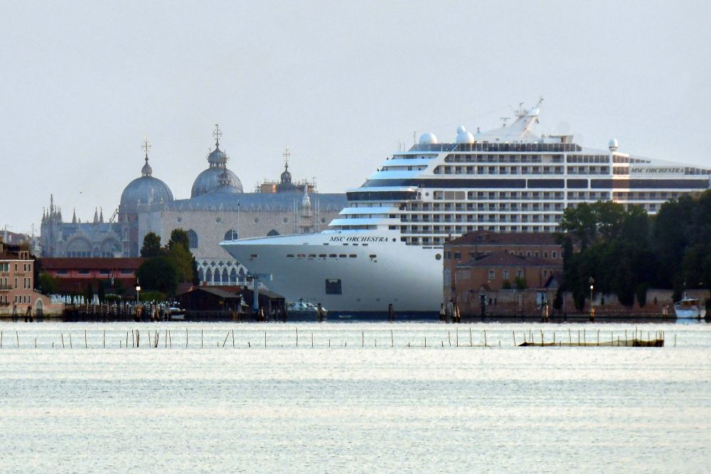 The MSC Orchestra cruise ship sails past St. Mark's Square and the Doge's palace as it arrives on June 03, 2021 in Venice, Italy. u00e2u20acu201d ETX Studio pic