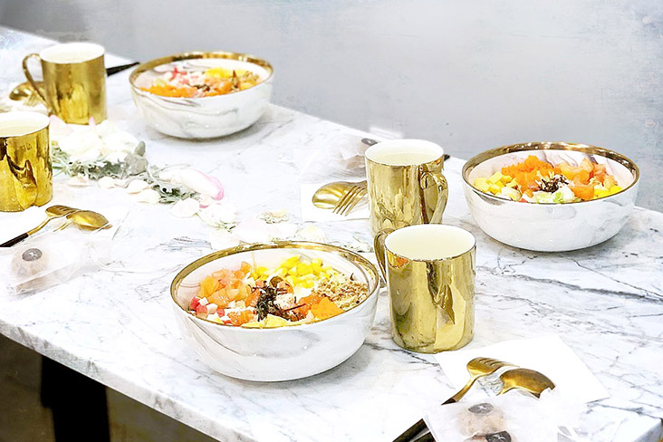 A healthy sit-down dinner at home, with takeaway or delivery rice bowls.