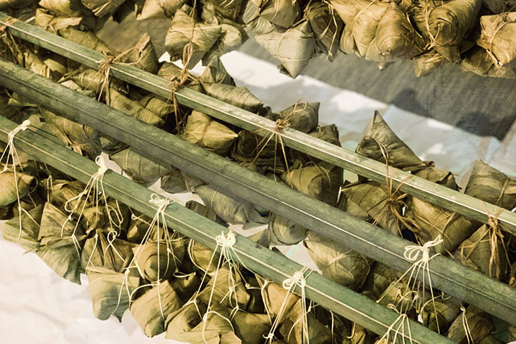 Rows of cooked rice dumplings or 'zongzi.'