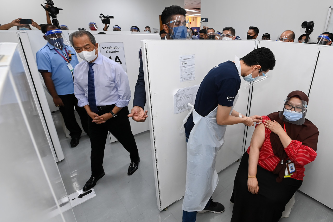 Prime Minister Tan Sri Muhyiddin Yassin attending the Private Partnership Industrial Covid-19 Immunisation Programme (PIKAS) at Texas Instrument Sdn Bhd in Kuala Lumpur, June 16, 2021. u00e2u20acu201d Bernama pic