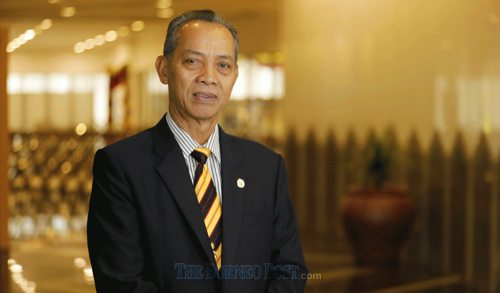 Assistant Minister of Local Government and Housing Datu Penguang Manggil says mobile banking is a welcome relief for people in the rural areas of Sarawak needing banking services. u00e2u20acu2022 Borneo Post pic