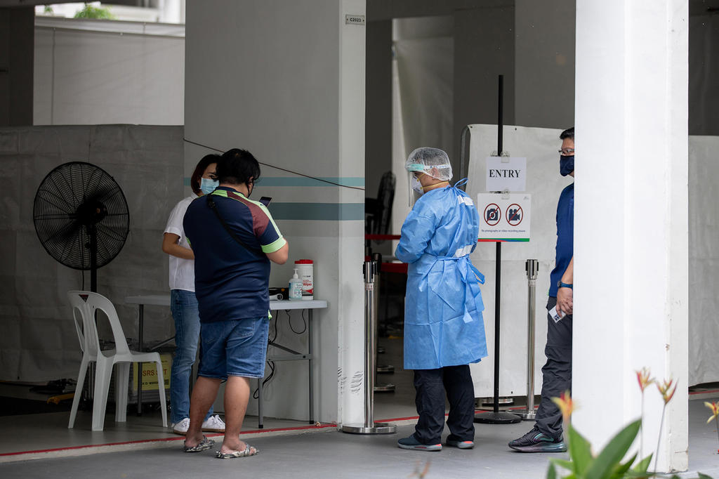 The Ministry of Health said that new Covid-19 cases have been uncovered in Block 506 Hougang Avenue 8 as well as neighbouring ones. u00e2u20acu2022 TODAY pic