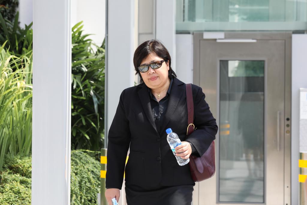 Phoon Chiu Yoke leaving the State Courts on May 24, 2021. u00e2u20acu2022 TODAY pic