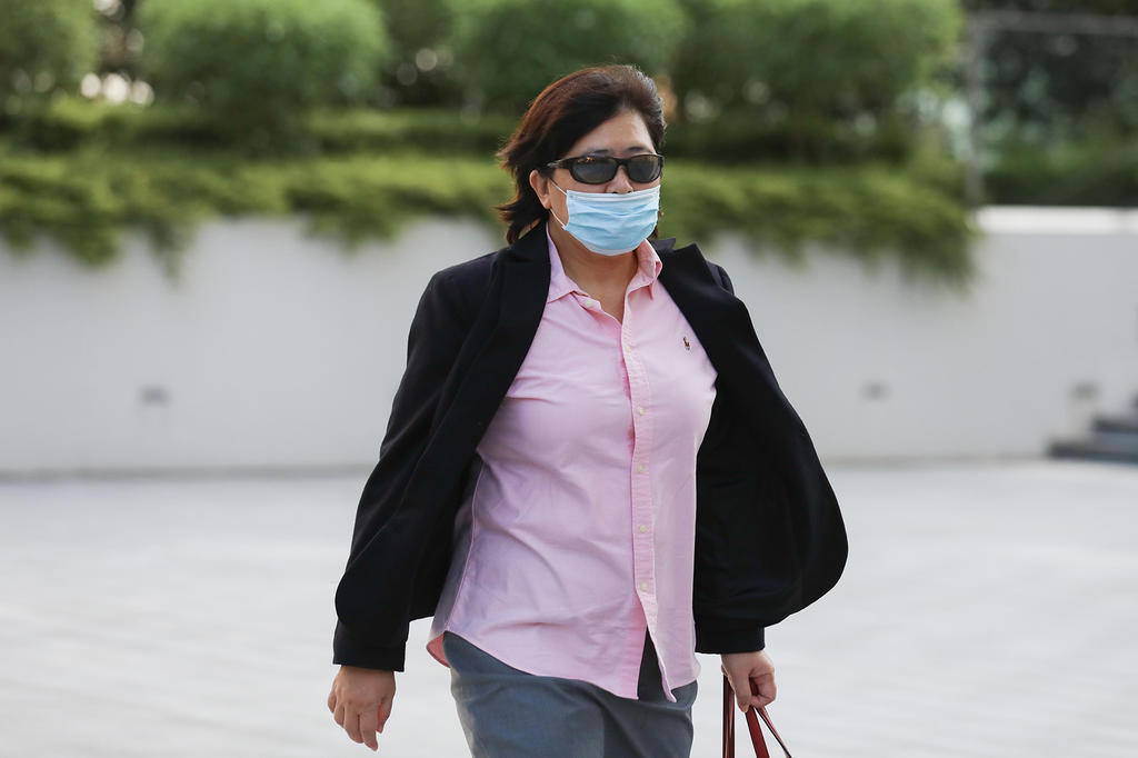 Phoon Chiu Yoke seen leaving the State Courts on June 15, 2021. She faces seven charges, six of which are for failing to wear a mask in public in breach of Covid-19 laws. u00e2u20acu2022 TODAY pic