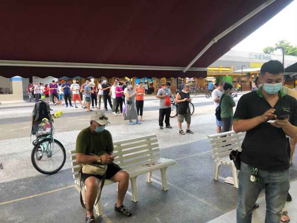 Close to 50 people were in a queue to register for the Sinovac vaccine at HeartlandHealth (Bedok South) clinic on the evening of June 17, 2021. u00e2u20acu2022 TODAY pic