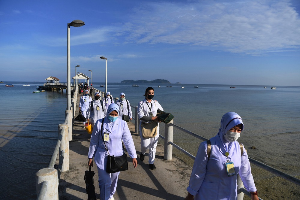 Health personnel arrive at Tioman Island administer Covid -19 vaccine shots for over 90 residents of Kampung Salang, June 29, 2021. u00e2u20acu2022 Bernama pic