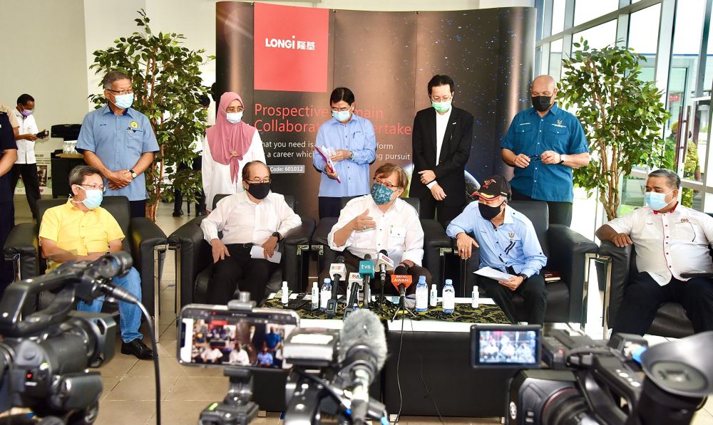 Chief Minister Datuk Patinggi Abang Johari Openg (centre) speaks during a press conference at Longi (Kuching) Sdn Bhd June 25, 2021. u00e2u20acu201d Picture courtesy of the Sarawak Information Department