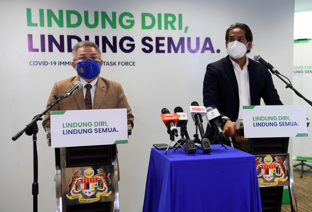 Health Minister Datuk Seri Dr Adham Baba and Science, Technology and Innovation Minister Khairy Jamaluddin during the Covid-19 Immunisation Task Force (CITF) press conference in Putrajaya, June 14, 2021. u00e2u20acu201d Bernama pic 