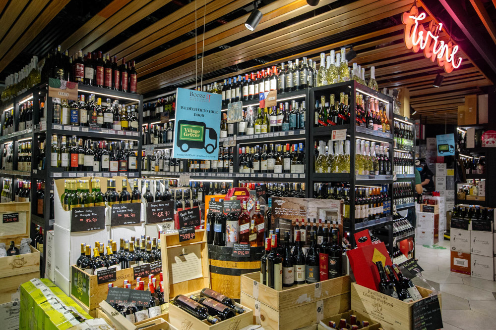 Bottles of alcohol are displayed for sale at Village Grocer in Bangsar, Kuala Lumpur June 4, 2021. u00e2u20acu201d Picture by Firdaus Latif
