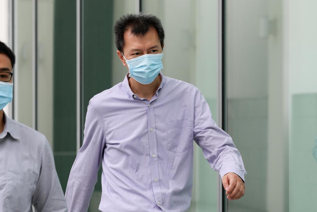 Bai Fan leaving the State Courts on May 27, 2021. u00e2u20acu201d TODAY pic
