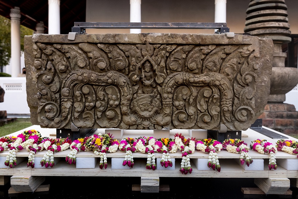An ancient sandstone lintel, a sacred late 10th or 11th century sandstone support beam, is pictured at the Bangkok National Museum during an event to mark their return from the United States to Thailand. u00e2u20acu2022 AFP pic via ETX Studio