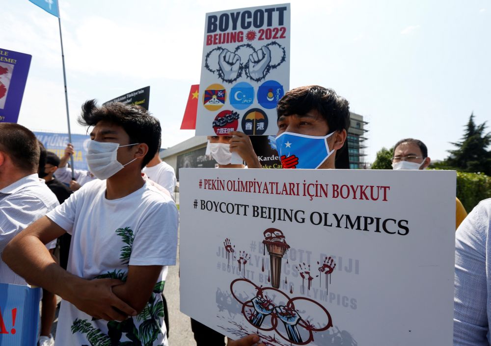 Ethnic Uighur demonstrators take part in a u00e2u20acu02dcNo Beijing 2022u00e2u20acu2122 protest in front of the Olympic House, the headquarters of Turkey's National Olympic Committee in Istanbul June 23, 2021. u00e2u20acu201d Reuters pic