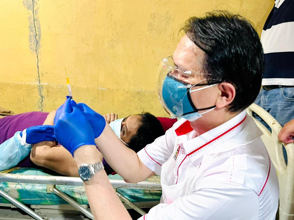 Tan Sri Dr Noor Hisham Abdullah prepares to administer a Covid-19 vaccination shot June 26, 2021. u00e2u20acu201d Picture via Twitter/Bernama