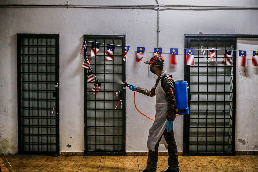Kuala Lumpur Fire and Rescue personnel conduct a sanitisation operation at Perkasa People’s Housing Project (PPR) in Kuala Lumpur, June 3, 2021. ― Picture by Hari Anggara