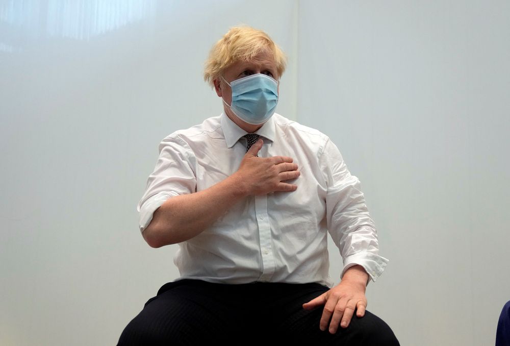 Britainu00e2u20acu2122s Prime Minister Boris Johnson reacts after receiving his second jab of the Oxford/AstraZeneca Covid-19 vaccine at the Francis Crick Institute in central London on June 3, 2021. u00e2u20acu201d AFP pic