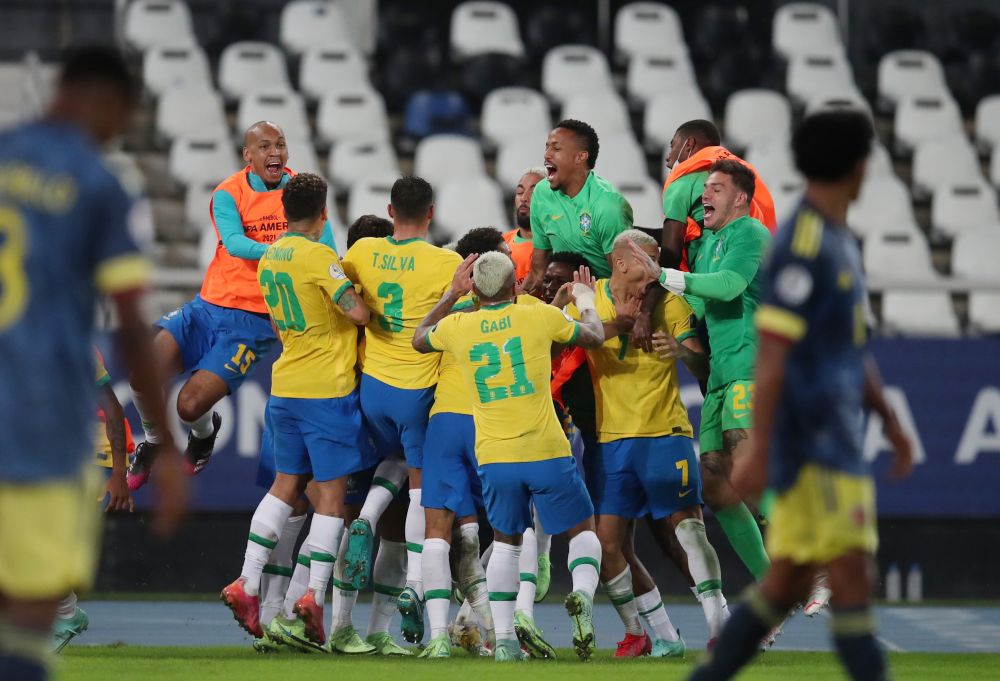 Brazil players celebrate their second goal against Colombia with teammates at Estadio Nilton Santos, Rio de Janeiro June 23, 2021. u00e2u20acu201d Reuters pic