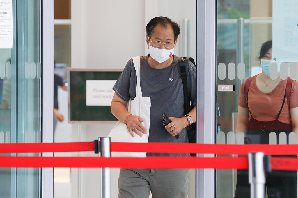 Chan Eng Hui leaving State Courts on April 23, 2021. u00e2u20acu2022 TODAY pic