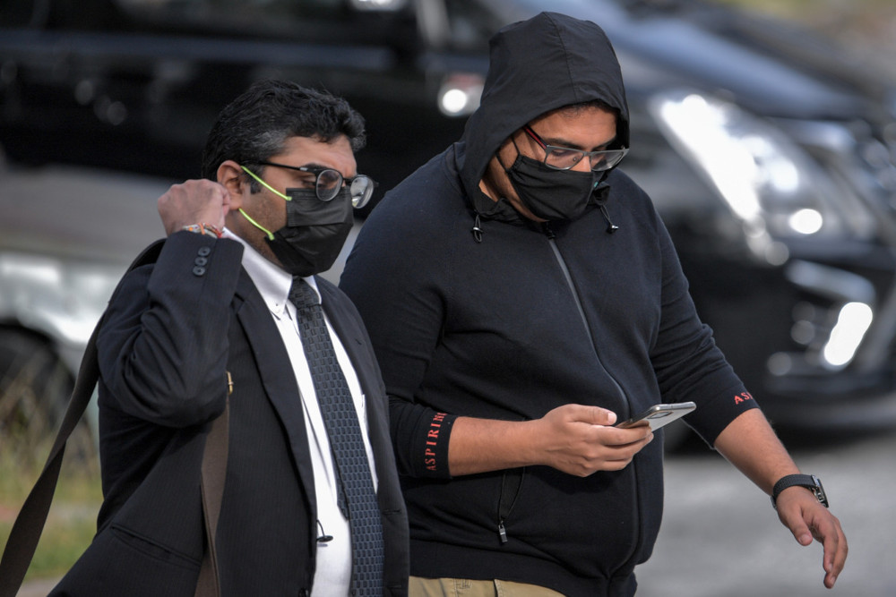 Datuk Mohd Farid Mohamad Ali, 42, and his brother, Mohd Fadhil Mohamad Ali, 38, pleaded not guilty after all the charges were read out separately before Judge Izralizam Sanusi. u00e2u20acu201d Bernama pic 