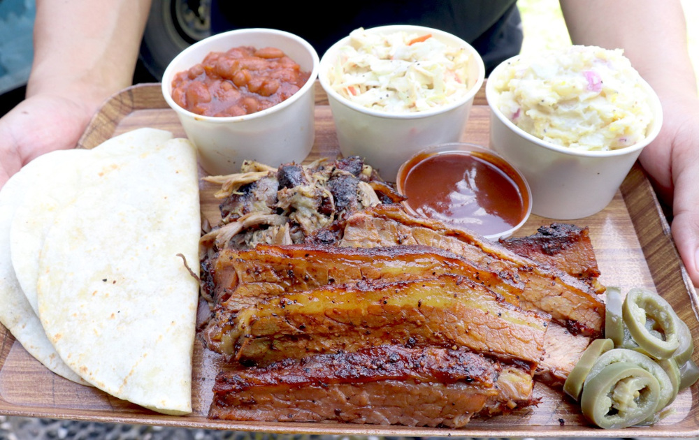 Cowboys Food Trucku00e2u20acu2122s Yellowstone Platter, featuring hour-slow-smoked beef brisket and pulled lamb, one of their best sellers on the Beepit app. u00e2u20acu201d Picture courtesy of Cowboys Food Truck