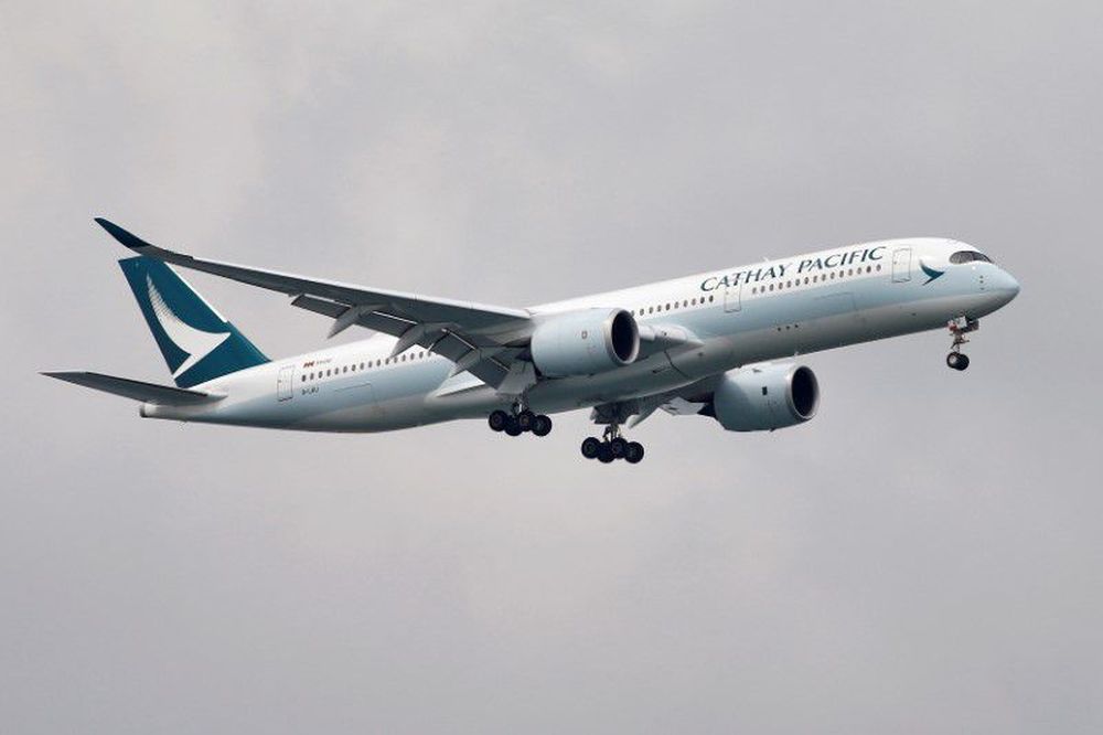 A Cathay Pacific Airways Airbus A350-900 airplane approaches to land at Changi International Airport in Singapore June 10, 2018. u00e2u20acu201d Reuters pic