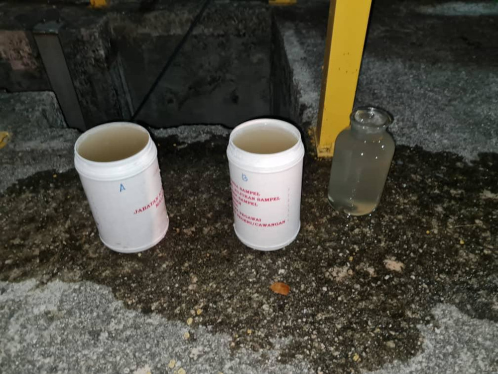 Water samples taken from the possible sources of pollution, which have been sent to the Department of Chemistry for chemical analysis. — Picture courtesy of Selangor Department of Environment
