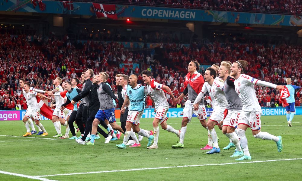 Denmark's players and staff celebrate after the match against Russia at the Parken Stadium, Copenhagen June 21, 2021. u00e2u20acu201d Reuters pic