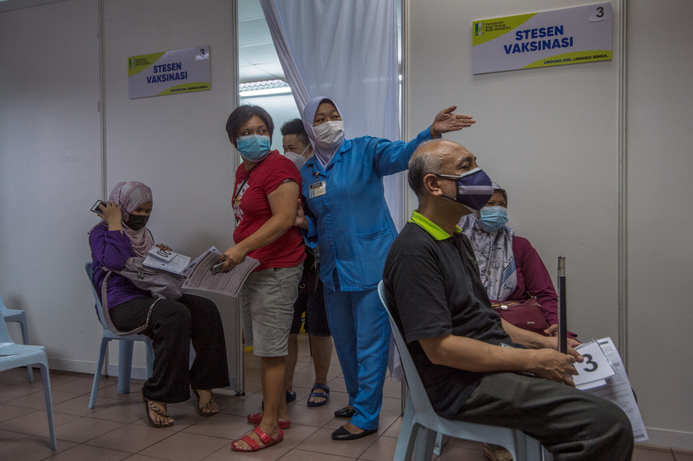 The disabled receive Covid-19 vaccinations at the Malaysia Association for the Blind (MAB) complex June 4, 2021. u00e2u20acu201d Picture by Shafwan Zaidon