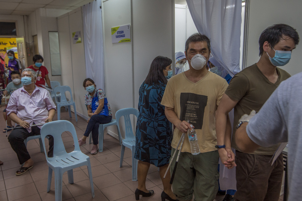 File picture shows the disabled receiving Covid-19 vaccinations at the Malaysia Association for the Blind (MAB) complex June 4, 2021. — Picture by Shafwan Zaidon