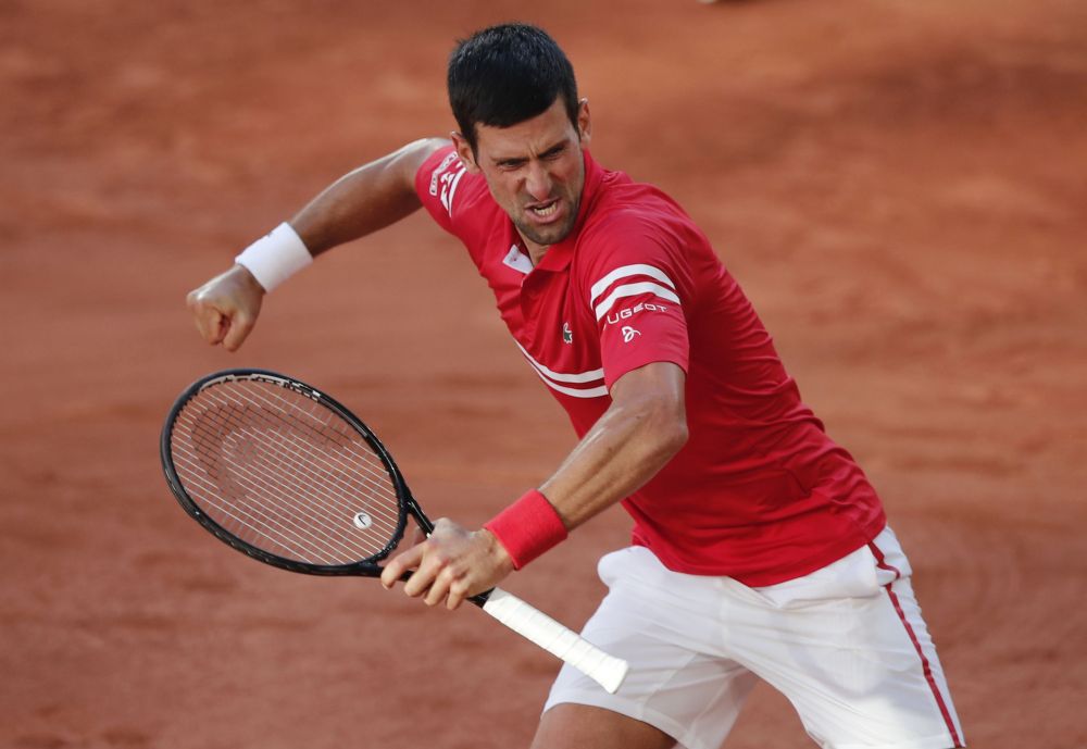 Serbia's Novak Djokovic celebrates winning the final against Greece's Stefanos Tsitsipas at Roland Garros, Paris June 13, 2021. u00e2u20acu201d Reuters pic